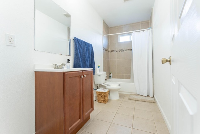 full bathroom with vanity, shower / bath combo, tile patterned floors, and toilet