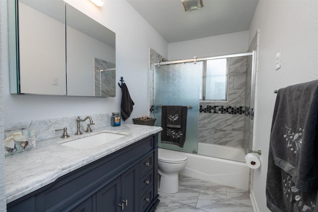 full bathroom with enclosed tub / shower combo, vanity, and toilet