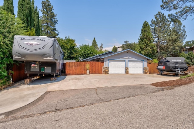 view of front of home featuring a carport