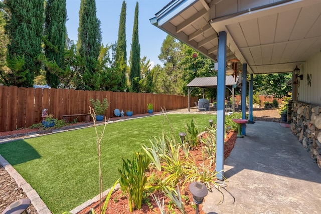 view of yard with a gazebo and a patio area