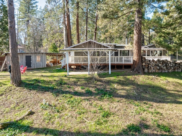 view of yard featuring a deck