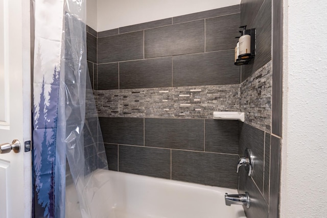 bathroom featuring shower / tub combo with curtain