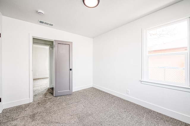 unfurnished bedroom featuring carpet floors