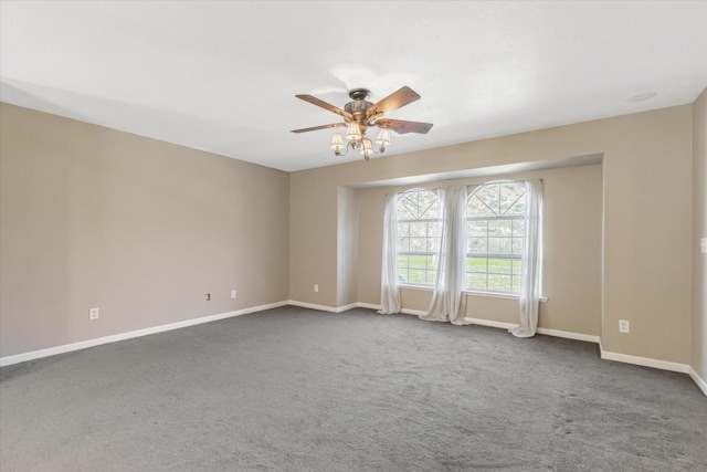 empty room featuring ceiling fan and carpet flooring