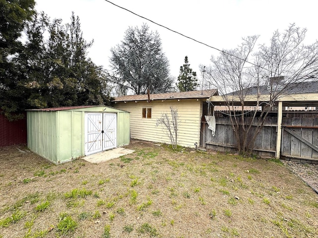 view of outdoor structure featuring a lawn