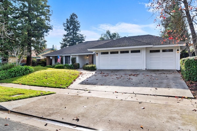 single story home with a garage and a front yard