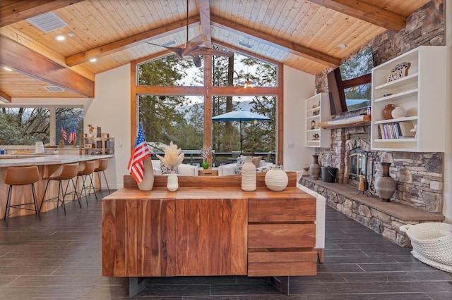 living room with high vaulted ceiling, dark hardwood / wood-style floors, wooden ceiling, and beam ceiling