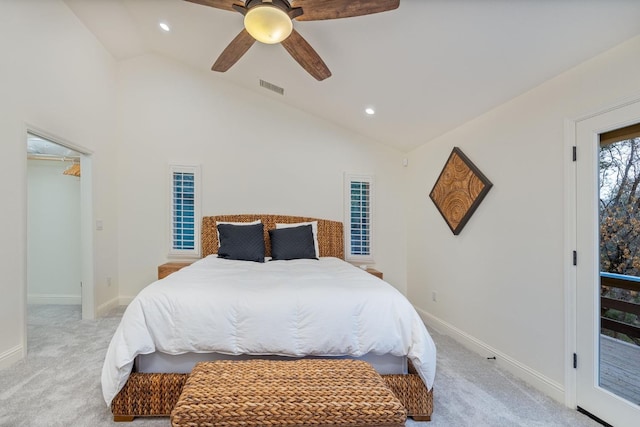 bedroom with lofted ceiling, light carpet, and ceiling fan