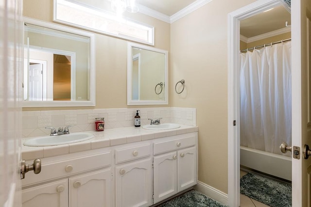 bathroom with vanity, backsplash, and ornamental molding