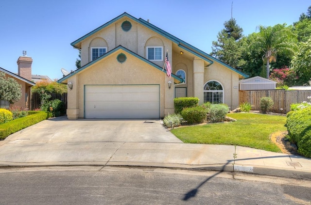 view of front facade featuring a garage and a front lawn