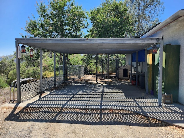 view of patio / terrace with a carport
