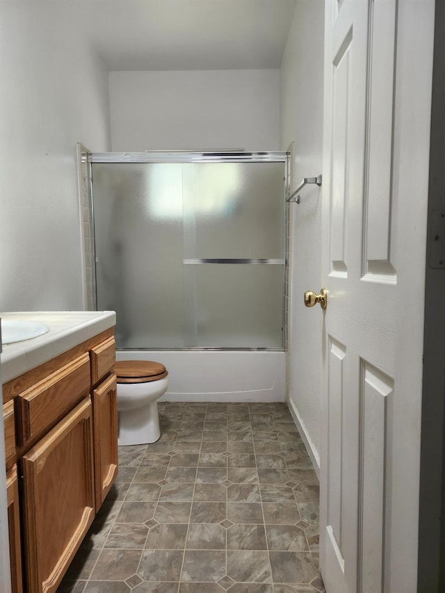 30684 Obanion Ln, Prather, CA 93651 - bathroom featuring vanity, toilet, and enclosed tub / shower combo