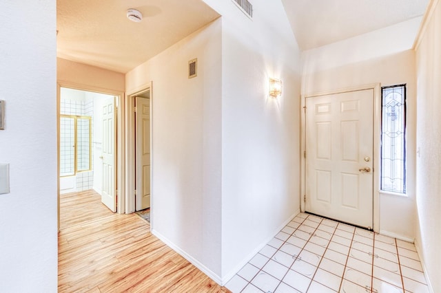 foyer featuring light wood-type flooring