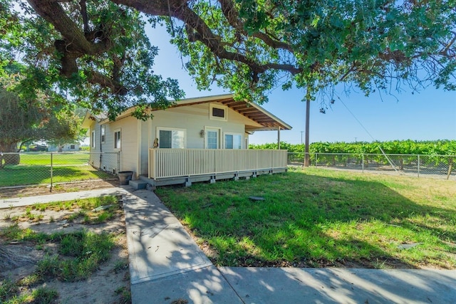 view of property exterior featuring a lawn