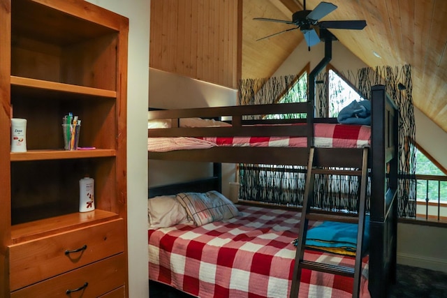 bedroom with lofted ceiling and wooden ceiling