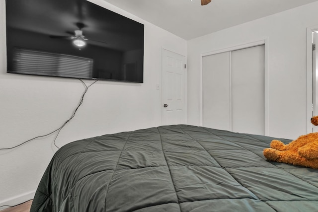 bedroom featuring a closet and ceiling fan