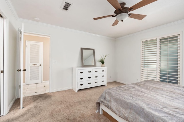 carpeted bedroom featuring ornamental molding and ceiling fan