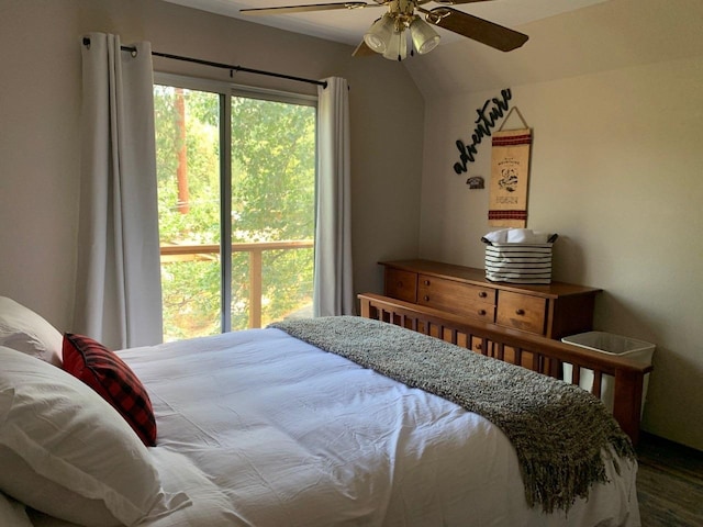 bedroom featuring multiple windows, vaulted ceiling, and ceiling fan