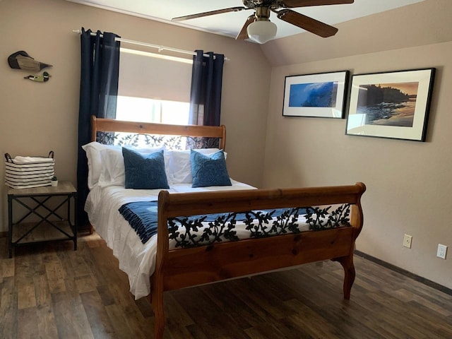 bedroom featuring dark wood-type flooring, ceiling fan, and lofted ceiling