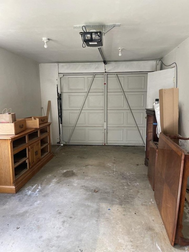 garage featuring a garage door opener