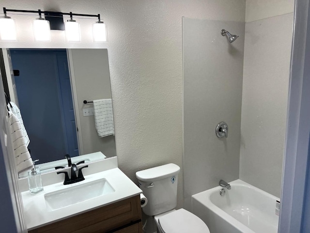 full bathroom with vanity, shower / bathtub combination, and toilet