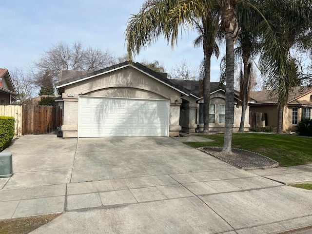 single story home with a garage and a front yard