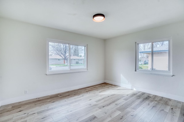 empty room with light wood-type flooring