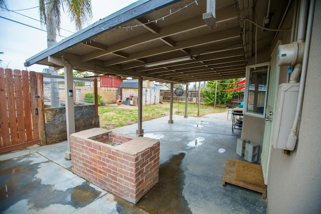 view of patio / terrace featuring a shed