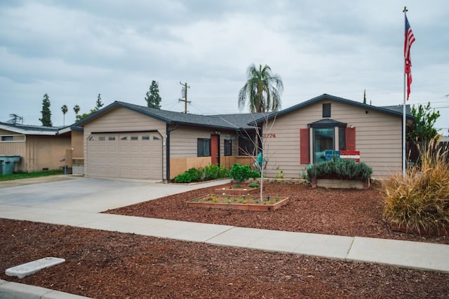 ranch-style home featuring a garage