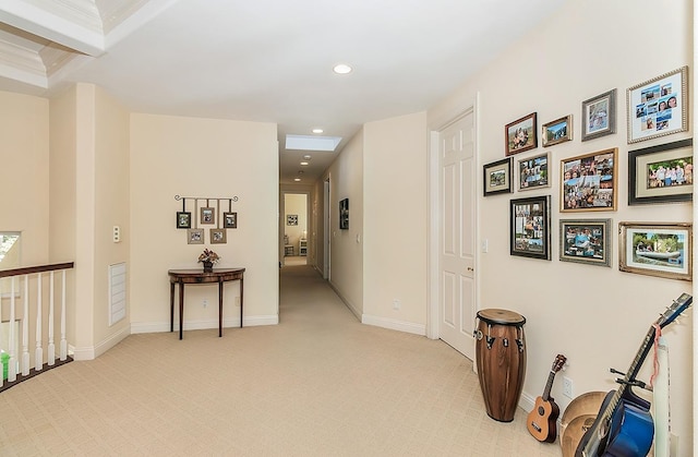 corridor featuring light carpet