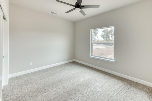 35710 Bonadelle Ave, Madera, CA 93636 - empty room featuring light carpet, a ceiling fan, and baseboards