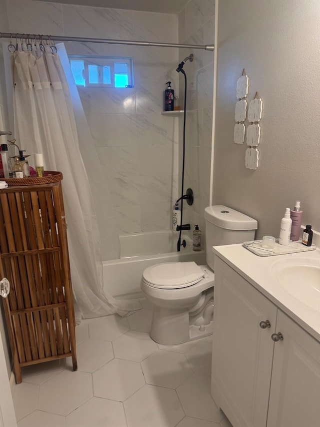 bathroom featuring shower / tub combo, vanity, and toilet