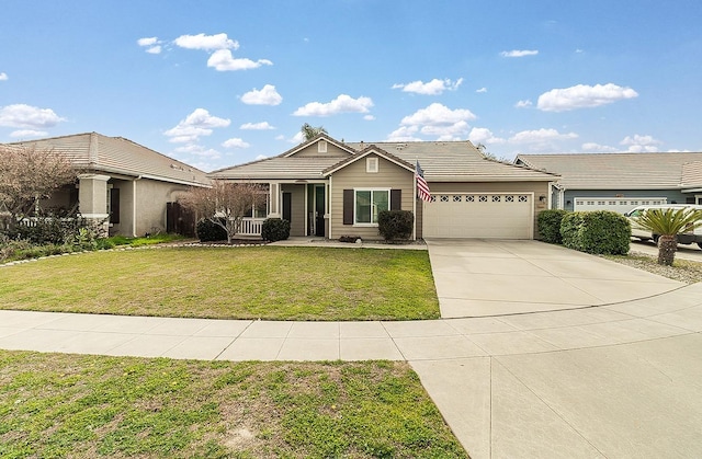 view of front of property with a garage, a front yard, and covered porch