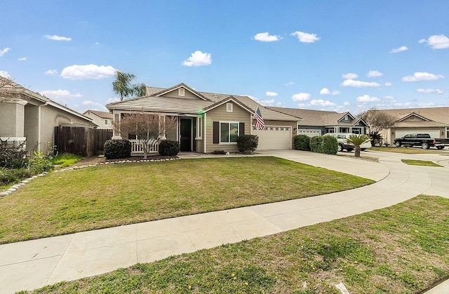 ranch-style house with a garage and a front yard