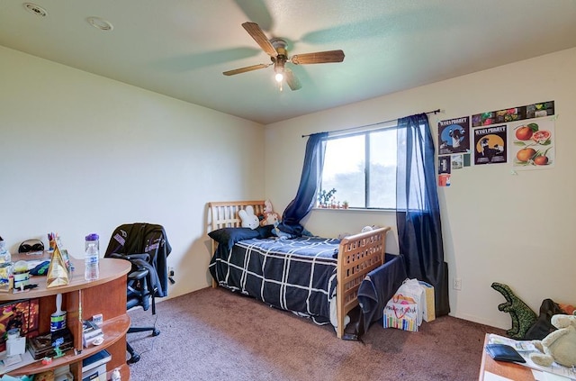 bedroom featuring ceiling fan and carpet floors