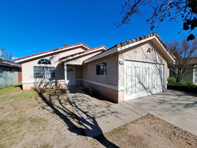 ranch-style house with a garage