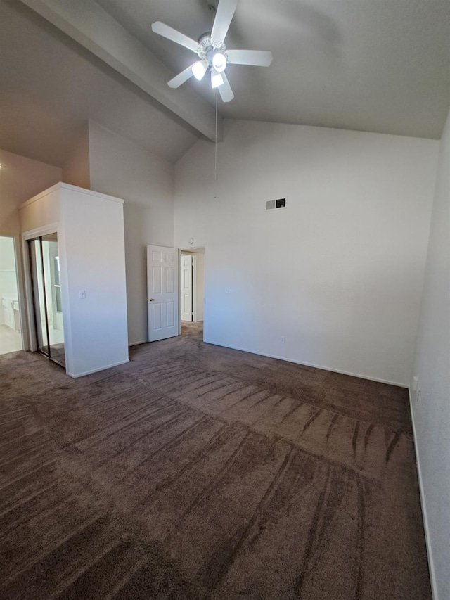 carpeted spare room featuring a ceiling fan, visible vents, beamed ceiling, and high vaulted ceiling