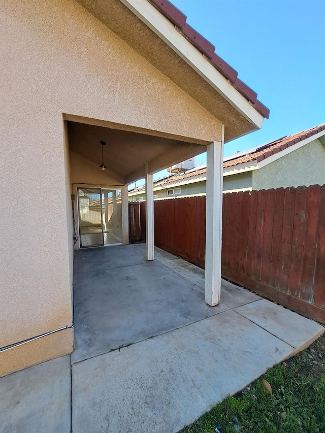 view of patio / terrace with fence