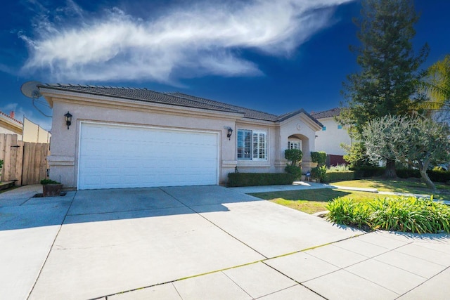 ranch-style house featuring a garage