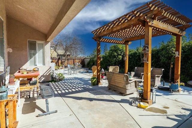 view of patio / terrace with a pergola and outdoor lounge area