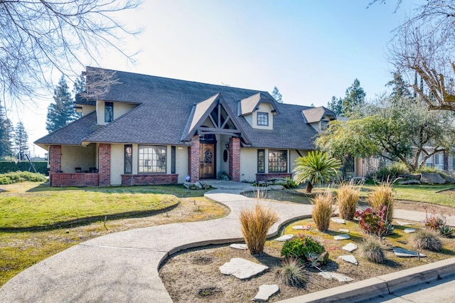 view of front of home with a front yard