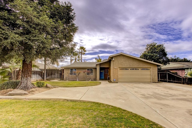 ranch-style home featuring a garage and a front yard