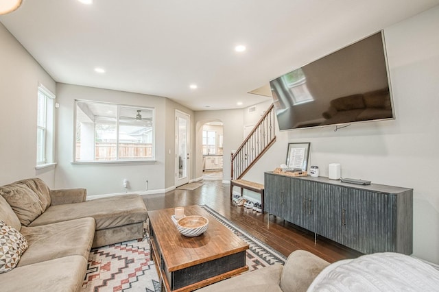 living room with dark hardwood / wood-style flooring