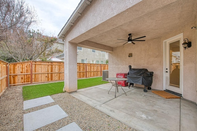 view of patio / terrace with ceiling fan and grilling area