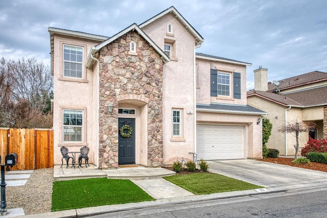 view of front of home with a garage