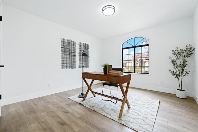 5017 W Locust Ave, Fresno, CA 93722 - office area featuring light wood-style floors and baseboards