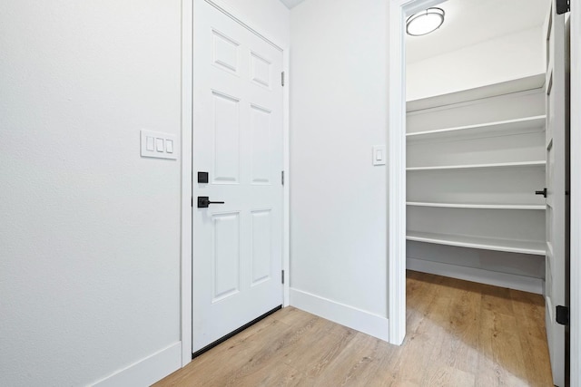5017 W Locust Ave, Fresno, CA 93722 - entryway with light wood-style floors