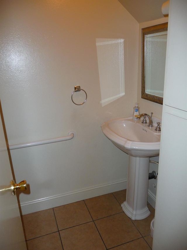 bathroom with tile patterned flooring