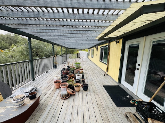 wooden terrace featuring a pergola