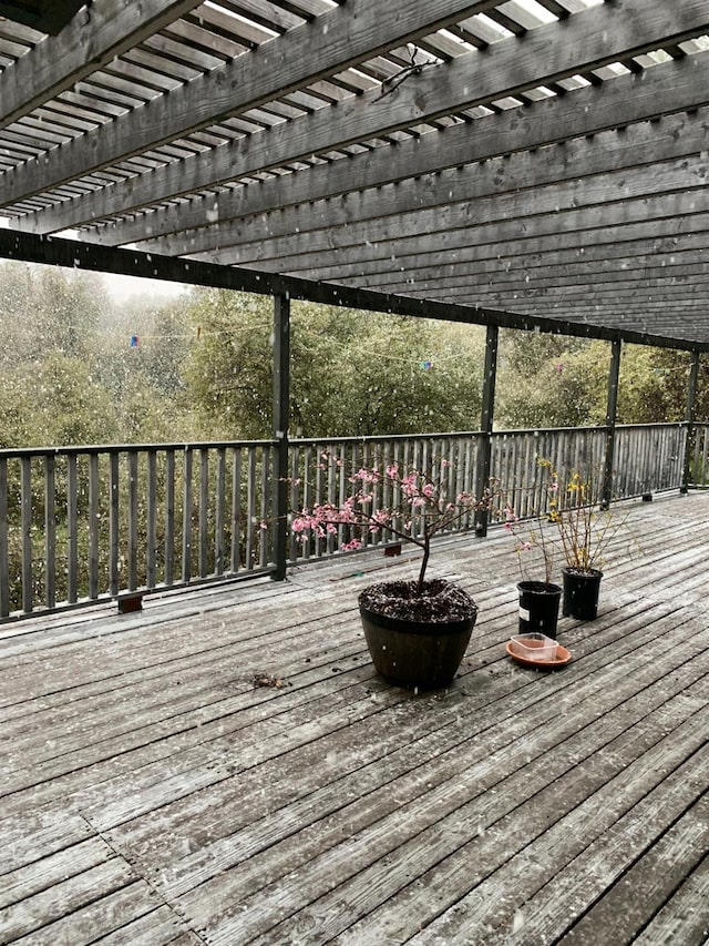 deck featuring a pergola